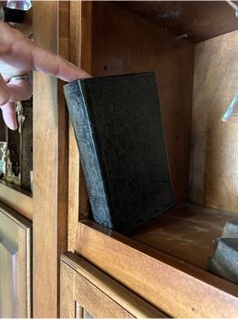 book tilt hidden door opener