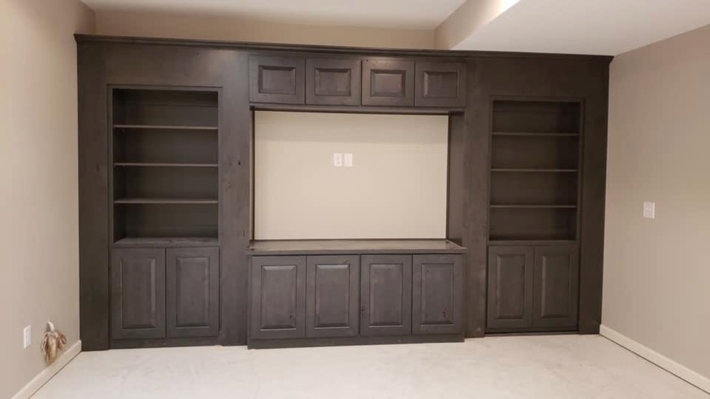 custom bookcase wall unit with hidden door